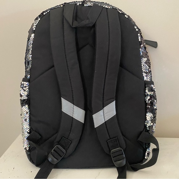 Justice Glitter Color Changing Backpack.
NWT - Picture 4 of 5